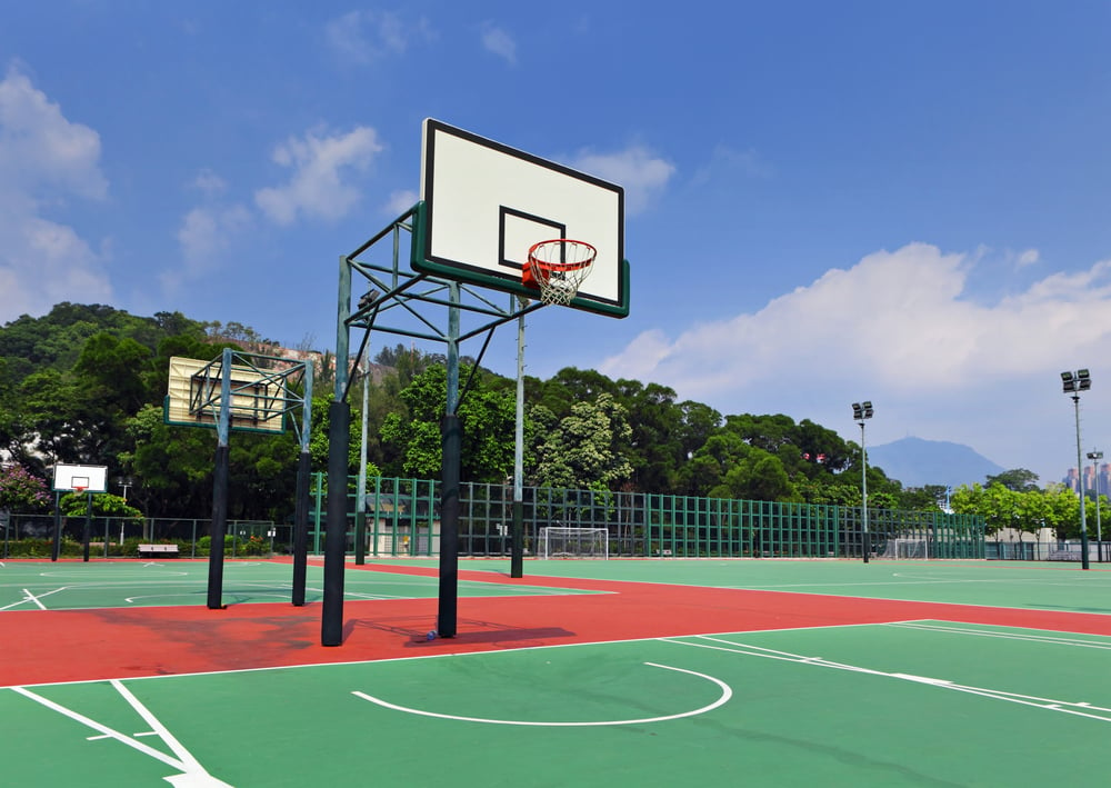 public basketball court with sports surfacing